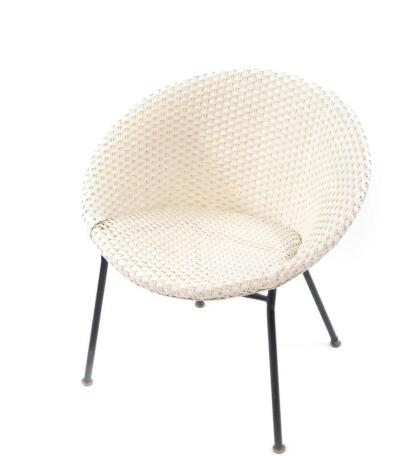 A Lloyd Loom Lusty cream bucket tub chair, raised on a black tubular frame,