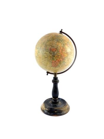 A Geographia 6" terrestrial globe, published by Geographia Ltd, 55 Fleet Street, London., raised on an ebonised wooden base.