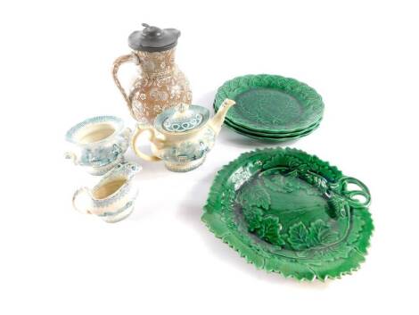 Three 19thC green leaf majolica plates, green leaf majolica dessert plate, pottery jug with pewter hinged lid transfer decorated in brown and white with a Japonnaise sheet pattern, together with an early 19th transfer decorated child's teapot, cream jug a