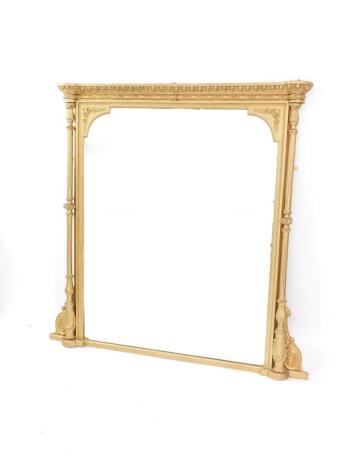 A 19thC gilt wood overmantel mirror, with egg and dart, and leaf and berry moulding, fluted and turned columns, 137cm high, 148cm wide.