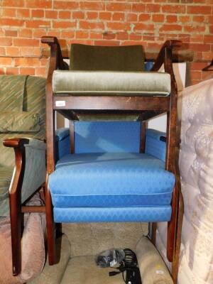 A 1940's fireside chair, together with a wing armchair. (2)