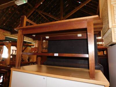 A teak and birch striped coffee table, 42cm high, 90cm wide, 46cm deep.