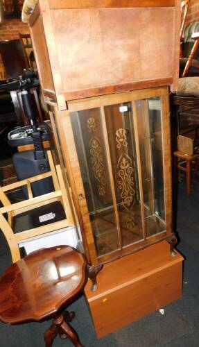 A mid 20thC walnut china cabinet, two blanket boxes, and an Italian wine table. (4)