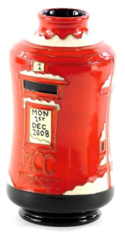 A Moorcroft Collectors Society vase, modelled in the form of a post box, with plaque dated Monday 1st December 2008, impressed and printed marks for 2008, 13cm high.