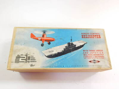 A Nulli Secundus remote controlled tin plate helicopter, with three speeds and joystick, will rise, hover, fly forwards or backwards, with instructions, boxed. - 4