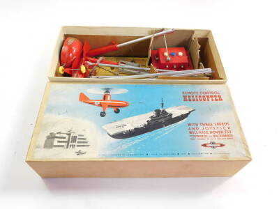 A Nulli Secundus remote controlled tin plate helicopter, with three speeds and joystick, will rise, hover, fly forwards or backwards, with instructions, boxed. - 5