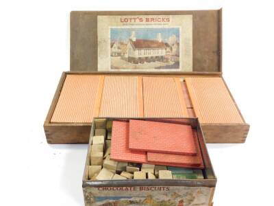 A Lott's Bricks Set No 3, plans lacking, boxed, together with a tin containing further building blocks, roofs, windows, etc. (2) - 2