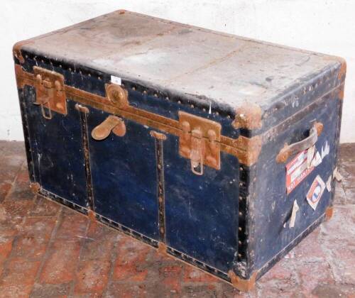 A travel trunk, with metal mounts, 57cm high, 94cm wide, 51cm deep.