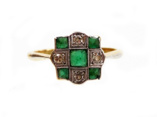 An Art Deco dress ring, of rectangular design, set with five emeralds and four tiny diamonds, in a raised platinum setting, on a yellow metal band stamped 18ct plat, ring size L½, 2.4g all in, in a H Maitland and Son Jewellers of Watford box.