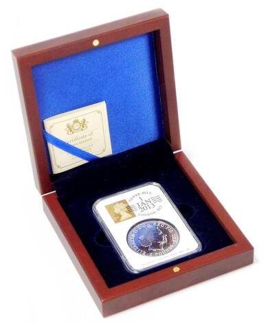 A 2013 pure silver UK Britannia date stamp collectors coin, with certificate of provenance, casing and box.