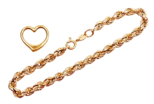 A rope twist bracelet, with a gold love heart charm stamped 375, the bracelet loop hallmarked 9ct and stamped MT, 18cm long.