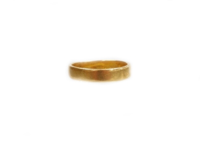 A 22ct gold wedding band, of plain design, makers stamp C and F, London 1980, ring size K ½, 3.5g.