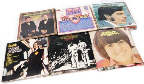 A quantity of 33rpm records, to include Milligan and Nesbit, Val, Bill Ives, Tony Orlando, Romantic Love Songs, Herman's Hermits, The Sweets, Kenny Rogers, Jim Reeves, Tom Jones, The New Seekers, The Dooleys, Moe Bandy, Gene Pitney, The Shangri Las, Donny