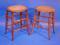 A pair of 19thC cane seated stools