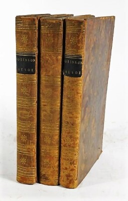 [Defoe (Daniel)] THE LIFE AND ADVETURES OF ROBINSON CRUSOE FIRST EDITION 2 vol.; uniform with; .- SERIOUS REFLECTIONS OF ROBINSON CRUSOE WITH HIS VISION OF THE ANGELIC WORLD... engraved frontispieces, foxed, contemporary patterned calf, 8vo, 1790. (3)