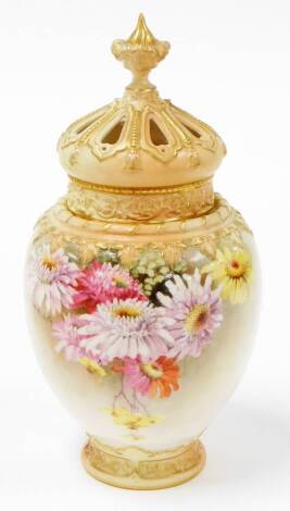 A Royal Worcester blush ivory pot pourri jar and cover, with decoration of pink and yellow peonies signed W Ricketts, the pierced and dome top picked out in gilt, with inner lid, with purple Royal Worcester stamped underside and numbered 2048, 25cm high.