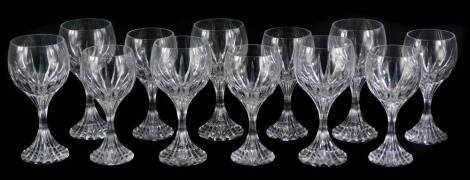 A set of Baccarat cut glass wine glasses, each with a waisted stem. (12)