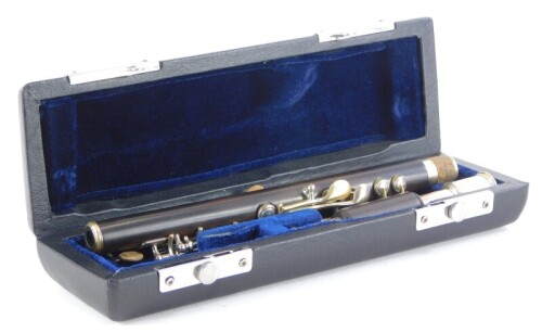 A Rudall Carte and Co Limited rosewood piccolo, impressed indistinctly for Oxford Street, London, number 5357, with silver plated mounts in a later fitted case.