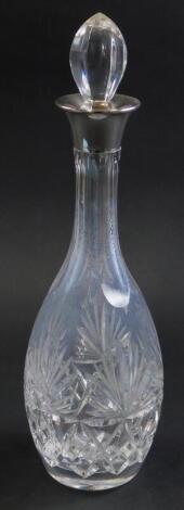 An Elizabeth II cut glass decanter, with silver collar, Birmingham 1979, 36cm high.