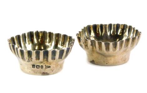 A pair of Victorian open silver salts, of floral form with fluted edges, Sheffield 1898, 1¼oz.