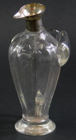 A Victorian glass whisky noggin with silver collar, lacking stopper, London 1896, 15cm high.