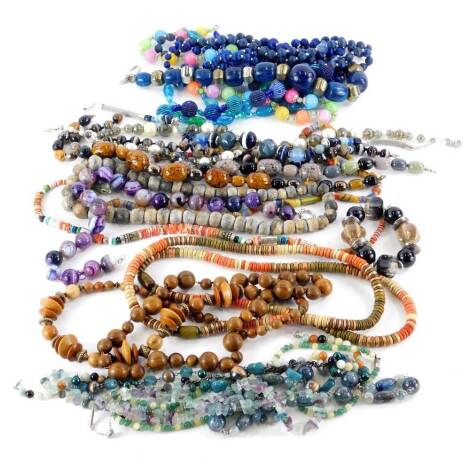 Various beaded necklaces, to include a purple natural stone beaded necklace, various wooden beaded necklaces, blue, turquoise and other necklaces. (a quantity)