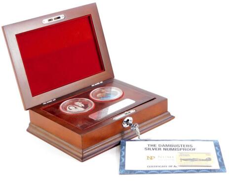 Two coin sets, to include a Queen Elizabeth II and Prince Philip's 70th Platinum Anniversary Collectors coin set, boxed, together with a Dambuster's silver numis proof Corker Hurricane proof. (2)