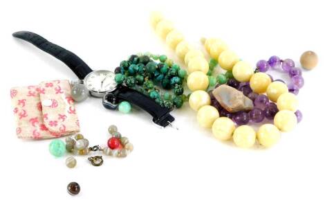 Various necklaces, to include a purple hardstone necklace, an imitation turquoise necklace, a Collezione wristwatch, various other loose beads, etc. (a quantity)