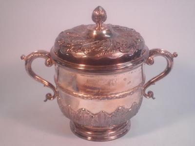 An Edward VII silver two handled cup & cover by Goldsmiths & Silversmiths Co Ltd