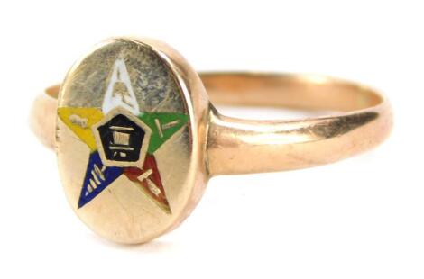 A yellow metal Masonic ring, the oval top decorated with a coloured enamel star, 2.9g all in.