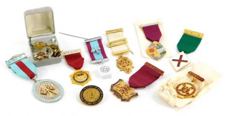 A collection of Masonic jewels, some with enamel decoration, to include The Royal Masonic Benevolent Institution stewards badge for 1976, another for The Festival of 1972, various other Masonic related jewels and badges, all base metal.