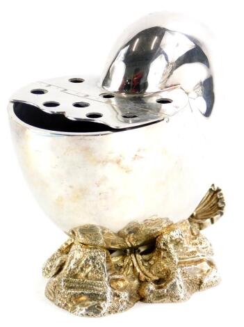 A Victorian novelty spoon warmer, cast in the form of a Nautilus shell on a stylised shell and rock base, impressed marks to underside, 16cm long.