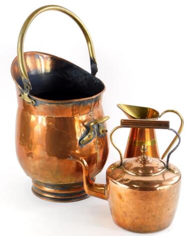 A Victorian copper and brass kettle, a coal scuttle and a flagon. (3)