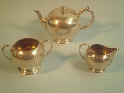 A Victorian silver breakfast service by Charles Stuart Harris