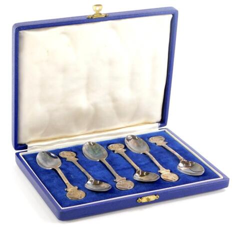 A set of six Elizabeth II silver teaspoons, the handle cast with a mythical beast, possibly a Phoenix, Birmingham 1957, 2¾oz.