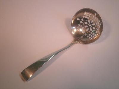 An Edward VII silver sifter spoon