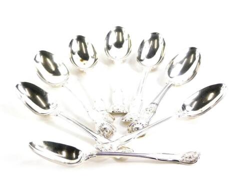 A set of eight Victorian silver table spoons, shell capped Kings pattern, monogrammed, London 1837, 18cm wide, 15.3oz. (8)