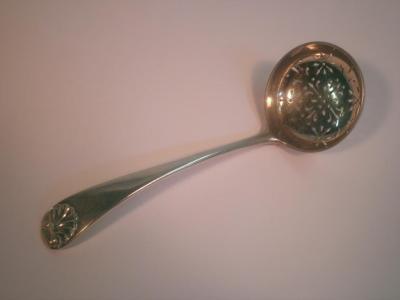 An Edward VII silver sifter spoon