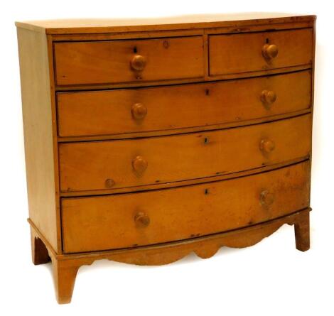 A 19thC pine bow fronted chest of drawers, with a plain top above two short and three long drawers, on bracket feet, 96cm high, 106cm wide, 53cm deep.