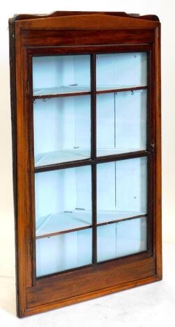 A 19thC mahogany hanging corner cabinet, with a single glazed door, painted interior, 142cm high, 85cm wide.