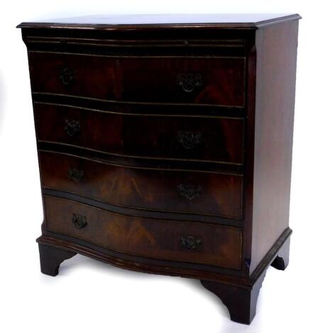 A mahogany and boxwood strung chest of drawers in George III style, with two short and three long drawers on bracket feet, 73cm high, 61cm wide.