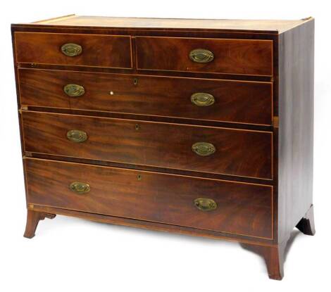 A 19thC mahogany box strung chest of drawers, with an arrangement of two drawers and four long graduated drawers, each with oval brass handles on bracket feet, the lower part of a linen press, 106cm high x 132cm wide, 56cm deep.