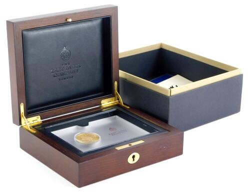 An East India Company Limited Edition gold 2018 British Trade Dollar, 1oz gold proof coin, 24ct number 56 of 2000 with certificate, lockable case etc.