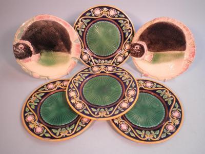 A set of four Majolica side plates