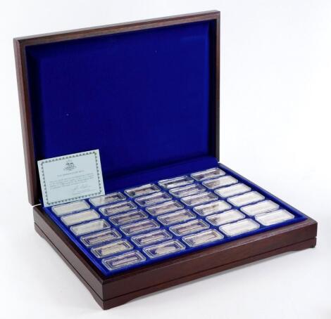 A set of thirty sterling silver Birmingham Mint 150th anniversary of the Rainhill Trials medallions, each decorated with locomotives, 1oz each, in fitted case.