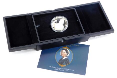 A Florence Nightingale 200th Anniversary silver proof 5oz coin, with selective 24ct gold plate, 999/1000 standard silver issued 2020 by the Guernsey Mint, in fitted case.