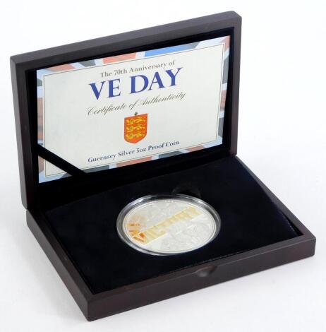 A 70th Anniversary of VE Day Guernsey Mint silver 5oz proof coin, with certificate in fitted case.