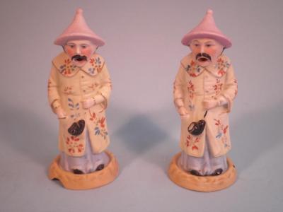 A pair of late 19thC German bisque incense burners
