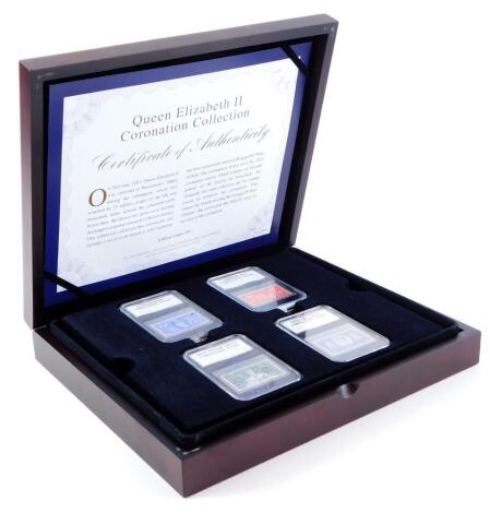 The Elizabeth II Coronation collection, with certificate of authenticity, limited edition of 495, containing samples of each of the currency of the Queen of the Monarch and for stamps, in fitted case.