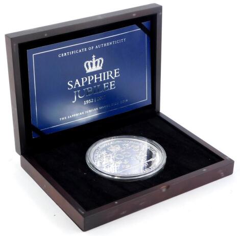 A Sapphire Jubilee silver one kilo coin, the denomination of one hundred pounds, with certificate and fitted case.